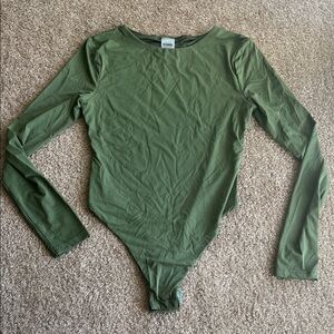 Kittenish crewneck long sleeve bodysuit